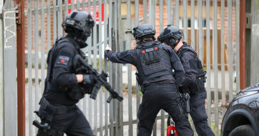 “Police Conduct Search at Oldham Storage Facility”