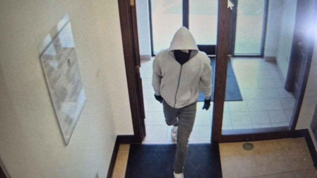 “Fatal Bank Robbery Leaves Two Dead, Perpetrator At Large”