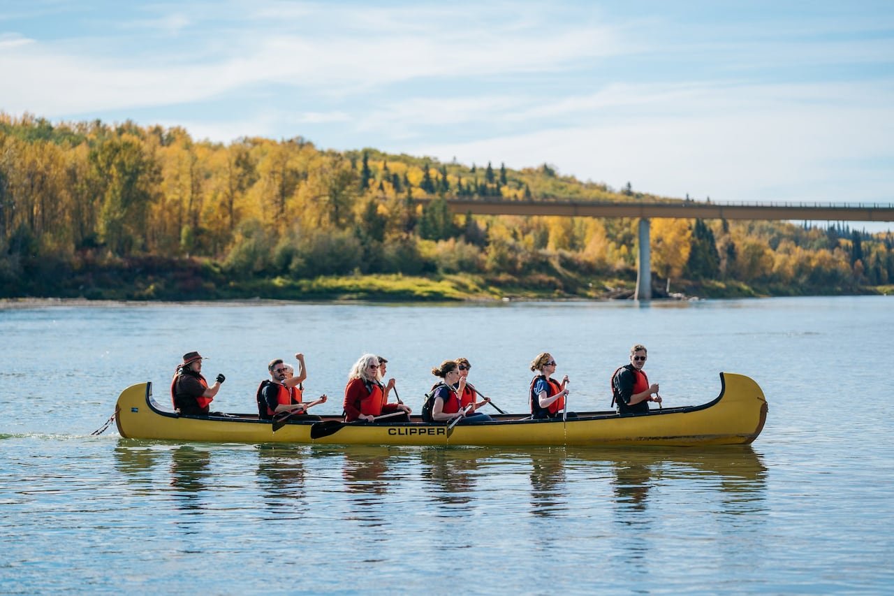 Image of people in a canoe on a river.