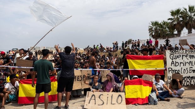 “Migrants in Ceuta Demand Asylum Amid Repatriation Concerns”