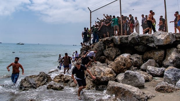 “Migrant Crisis in Ceuta: 57 Lives Lost in Border Breach”
